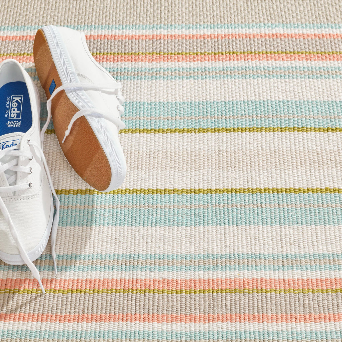 Daphne Stripe Handwoven Cotton Rug, Sky, styled in a room - Starboard Lane