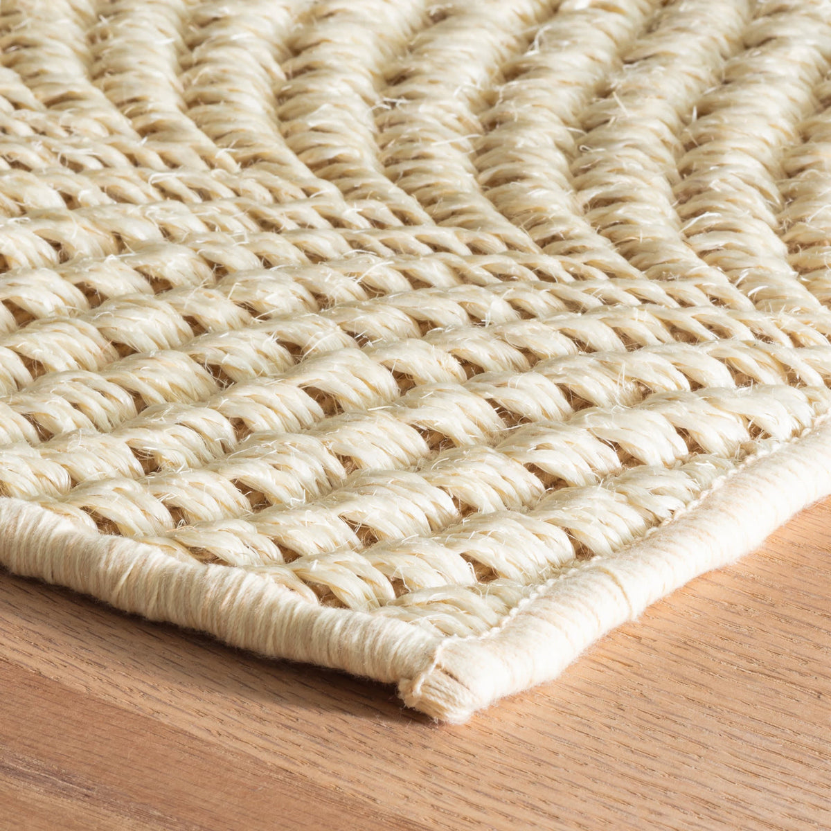 Wave Woven Sisal Rug, Sand, styled in a room - Starboard Lane