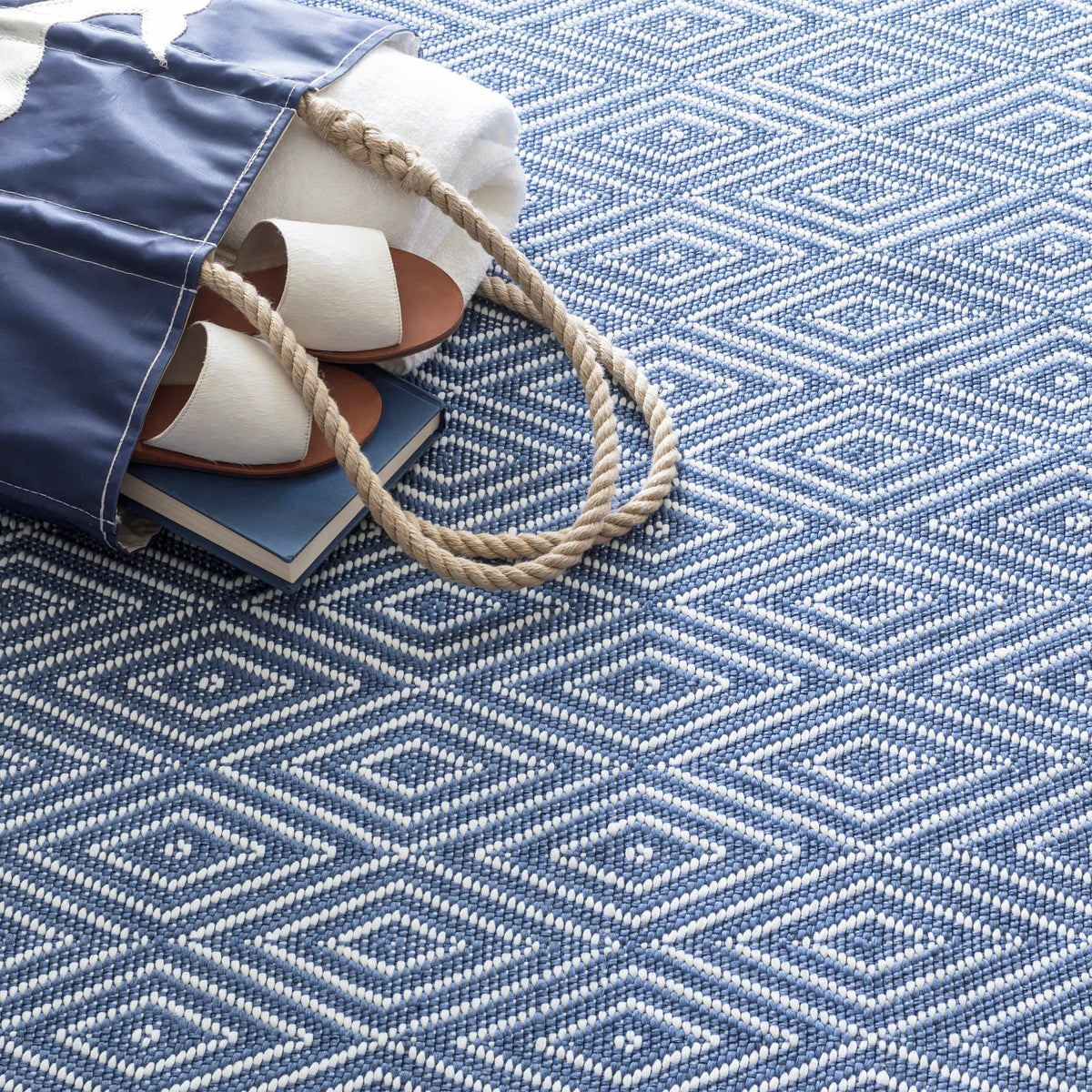 Diamond Indoor/Outdoor Rug, Denim/White, styled in a room - Starboard Lane