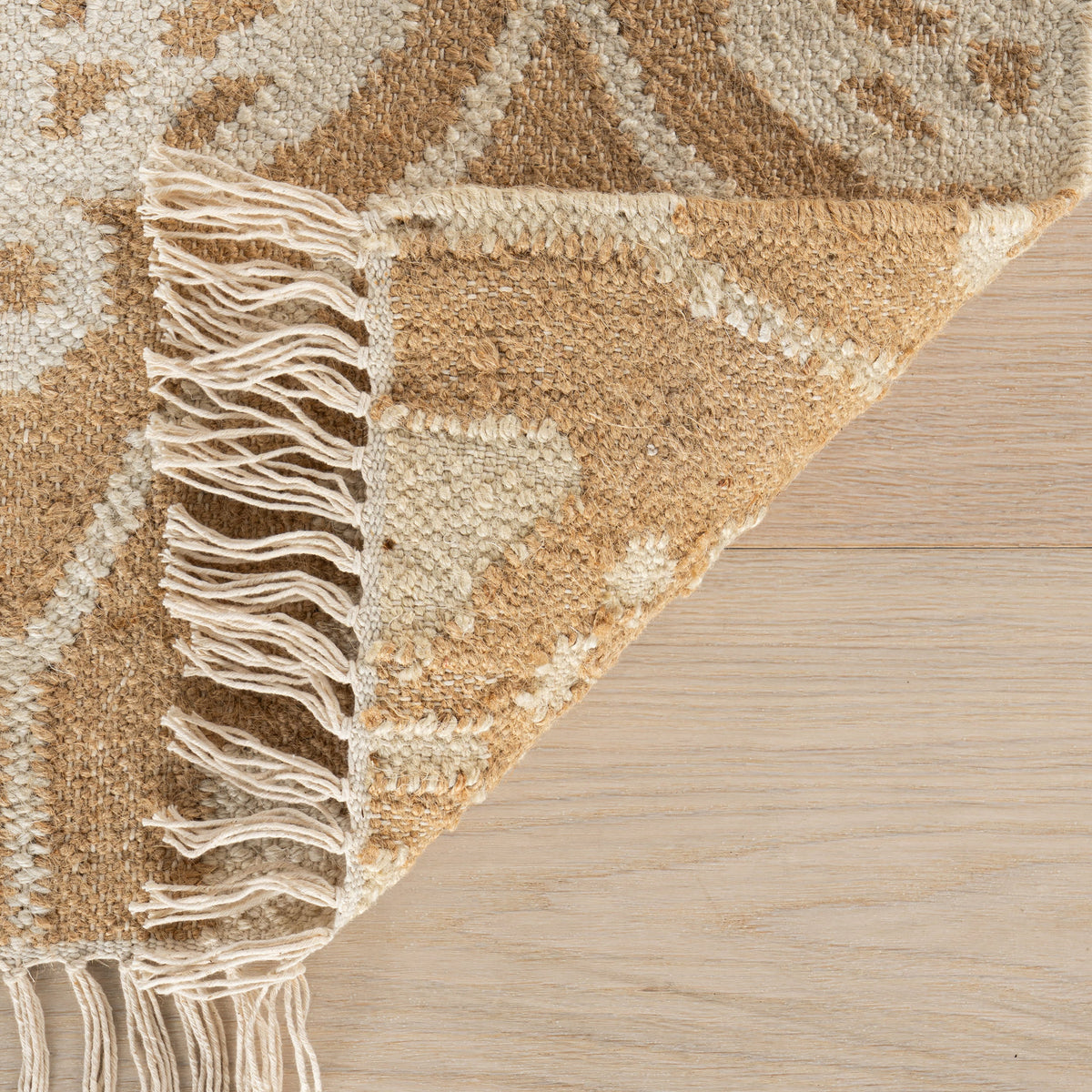 Odette Jute Rug - Natural, styled in a room - Starboard Lane