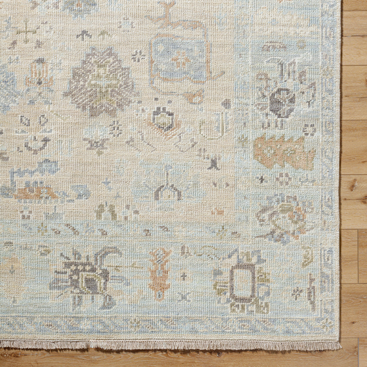 Antalya Hand-Knotted Wool Rug, styled in a room - Starboard Lane