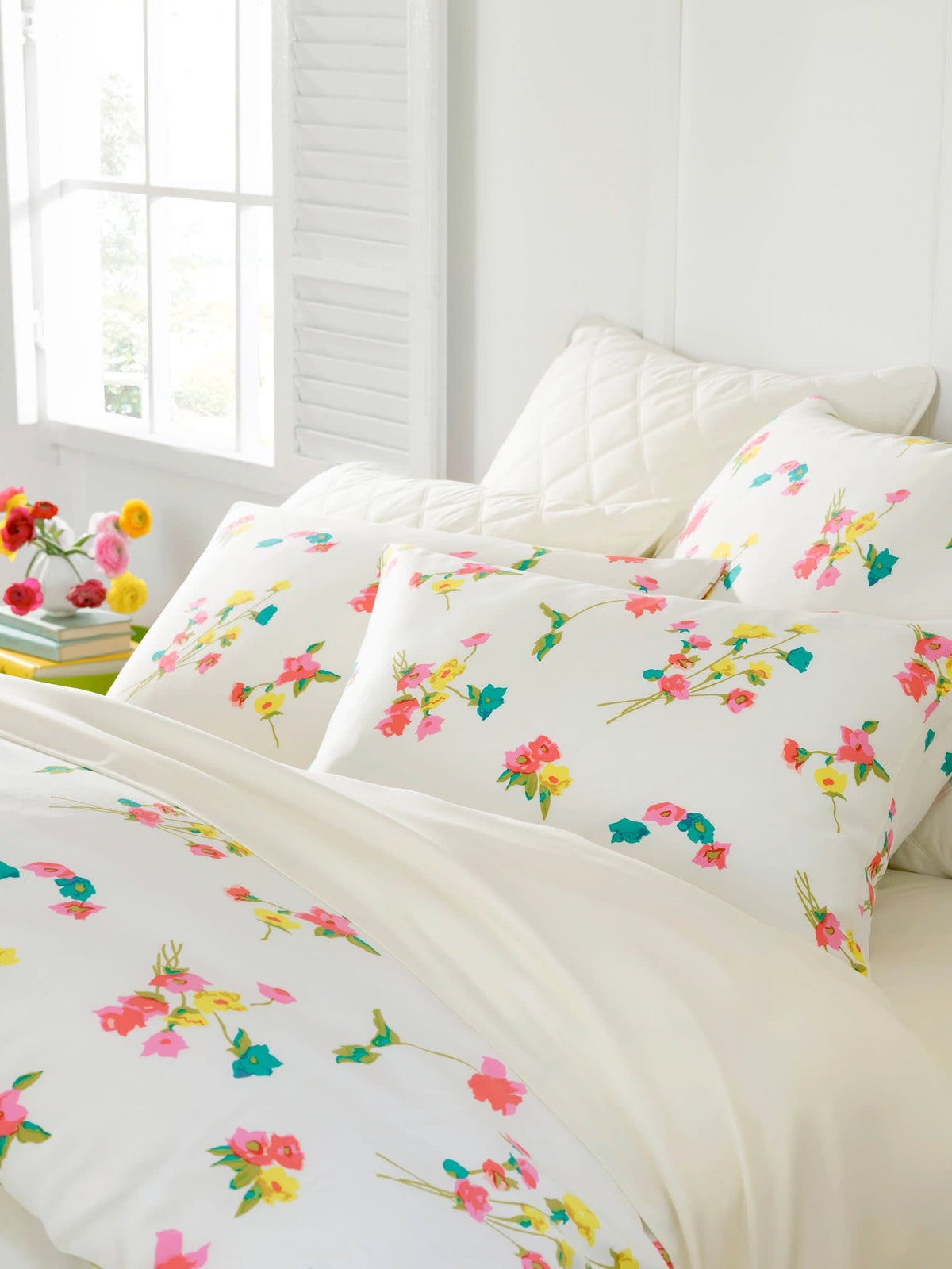 Silken Solid Sheet Set, Ivory, styled on the bed - Starboard Lane