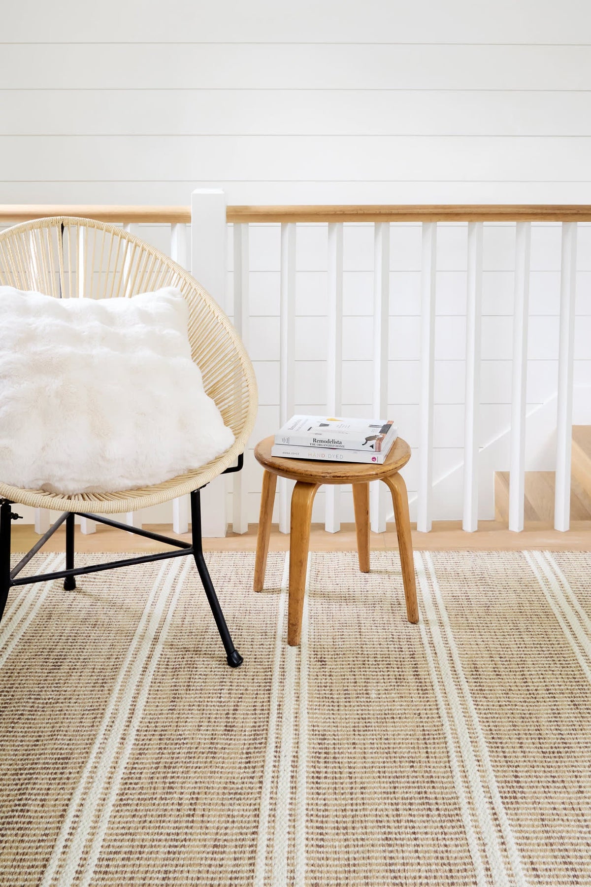 Malta Handwoven Wool Rug, Natural, styled in a room - Starboard Lane