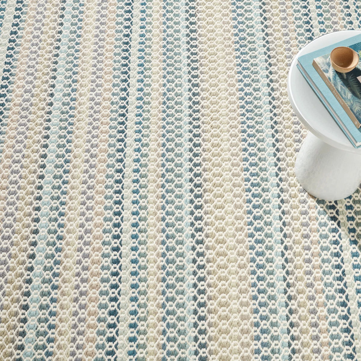 Poppy Handwoven Wool Rug, Blue, styled in a room - Starboard Lane