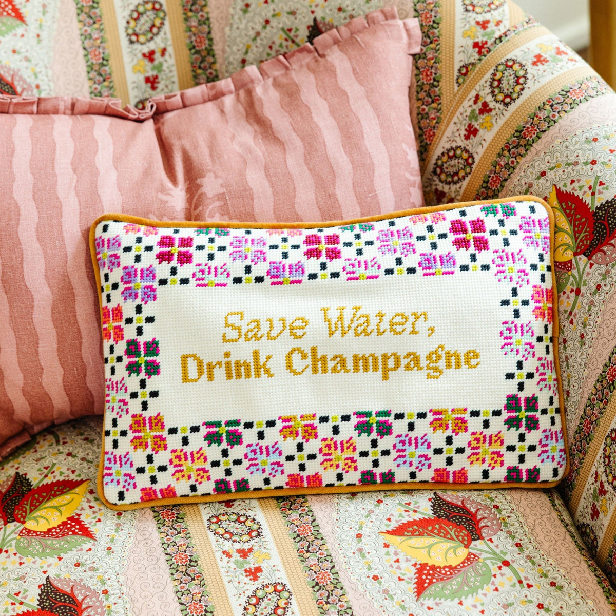 Drink Champagne Needlepoint Pillow, styled - Starboard Lane