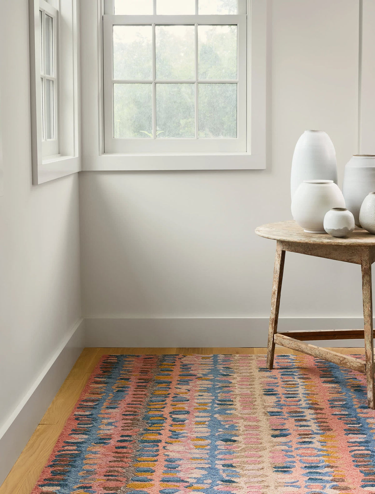 Paint Chip Hooked Wool Rug, Coral, styled in a room - Starboard Lane