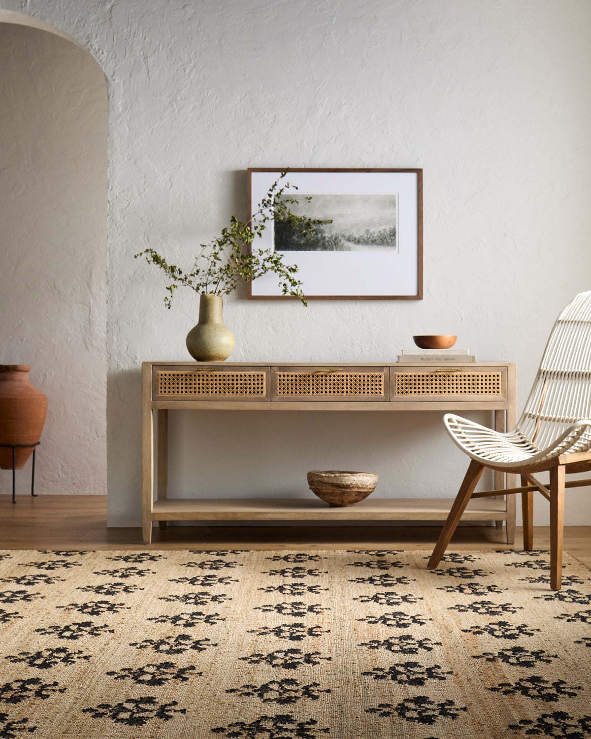 Fiorina Handwoven Jute Rug - Charcoal, styled in a room - Starboard Lane