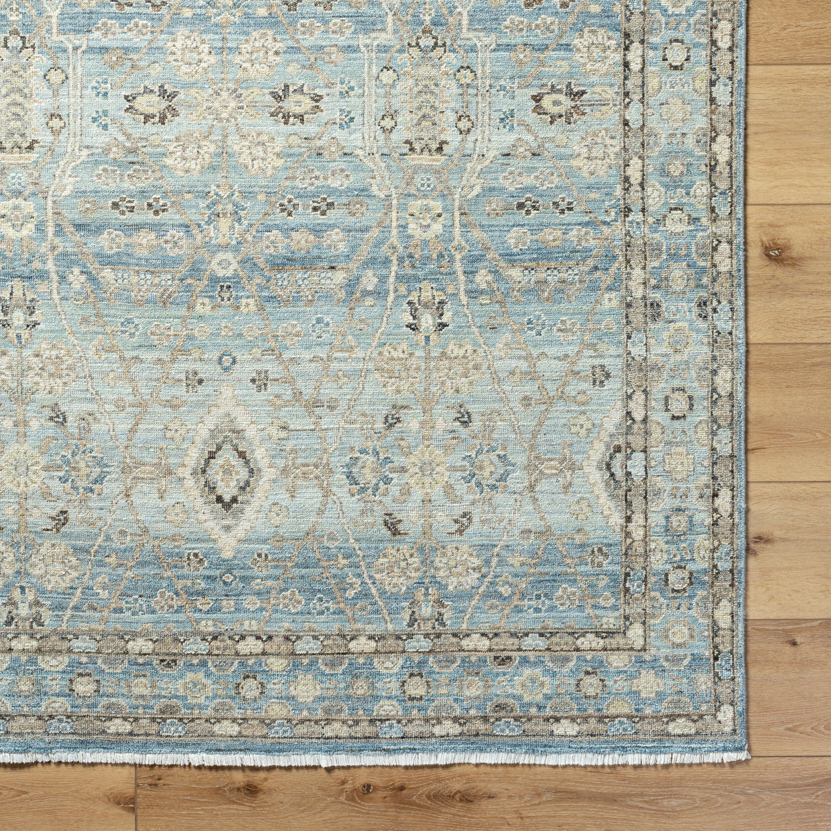 Khorasan Hand-Knotted Wool Rug - Sky Blue, styled in a room - Starboard Lane