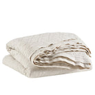 Washed Linen Quilt, Natural, styled on the bed - Starboard Lane