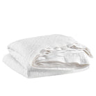 Washed Linen Quilt, White, styled on the bed - Starboard Lane