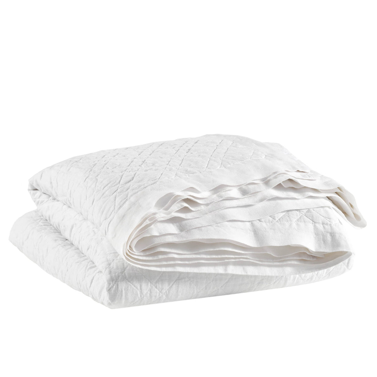 Washed Linen Quilt, White, styled on the bed - Starboard Lane
