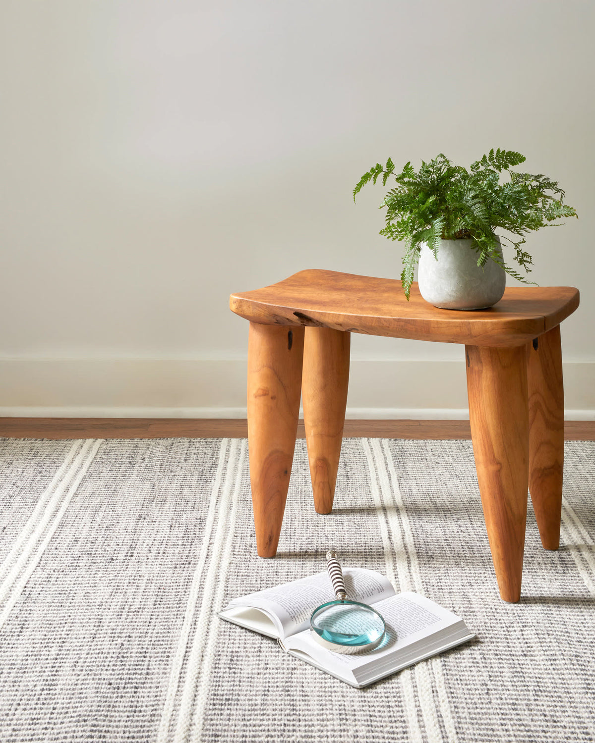 Malta Handwoven Wool Rug, Grey, styled in a room - Starboard Lane