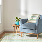 Long Slade Handwoven Cotton Rug, Teal, styled in a room - Starboard Lane