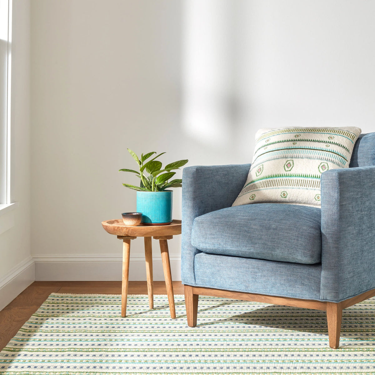 Long Slade Handwoven Cotton Rug, Teal, styled in a room - Starboard Lane