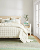 Long Slade Handwoven Cotton Rug, Teal, styled in a room - Starboard Lane