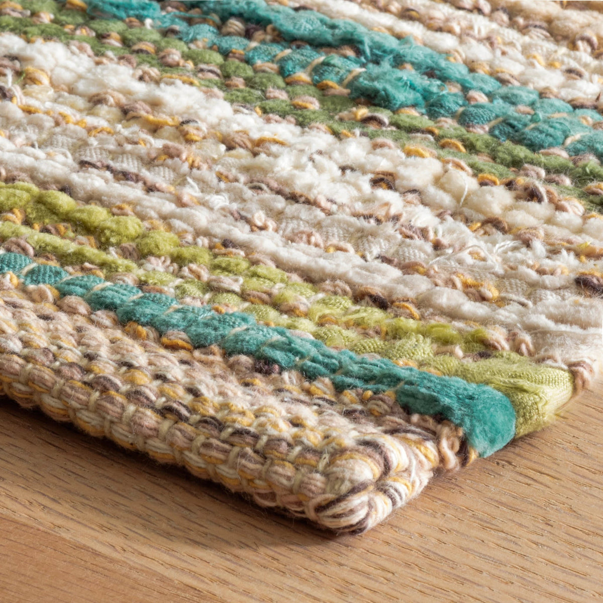 Francisco Handwoven Cotton Rug - Green, styled in a room - Starboard Lane