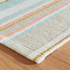Daphne Stripe Handwoven Cotton Rug, Sky, styled in a room - Starboard Lane
