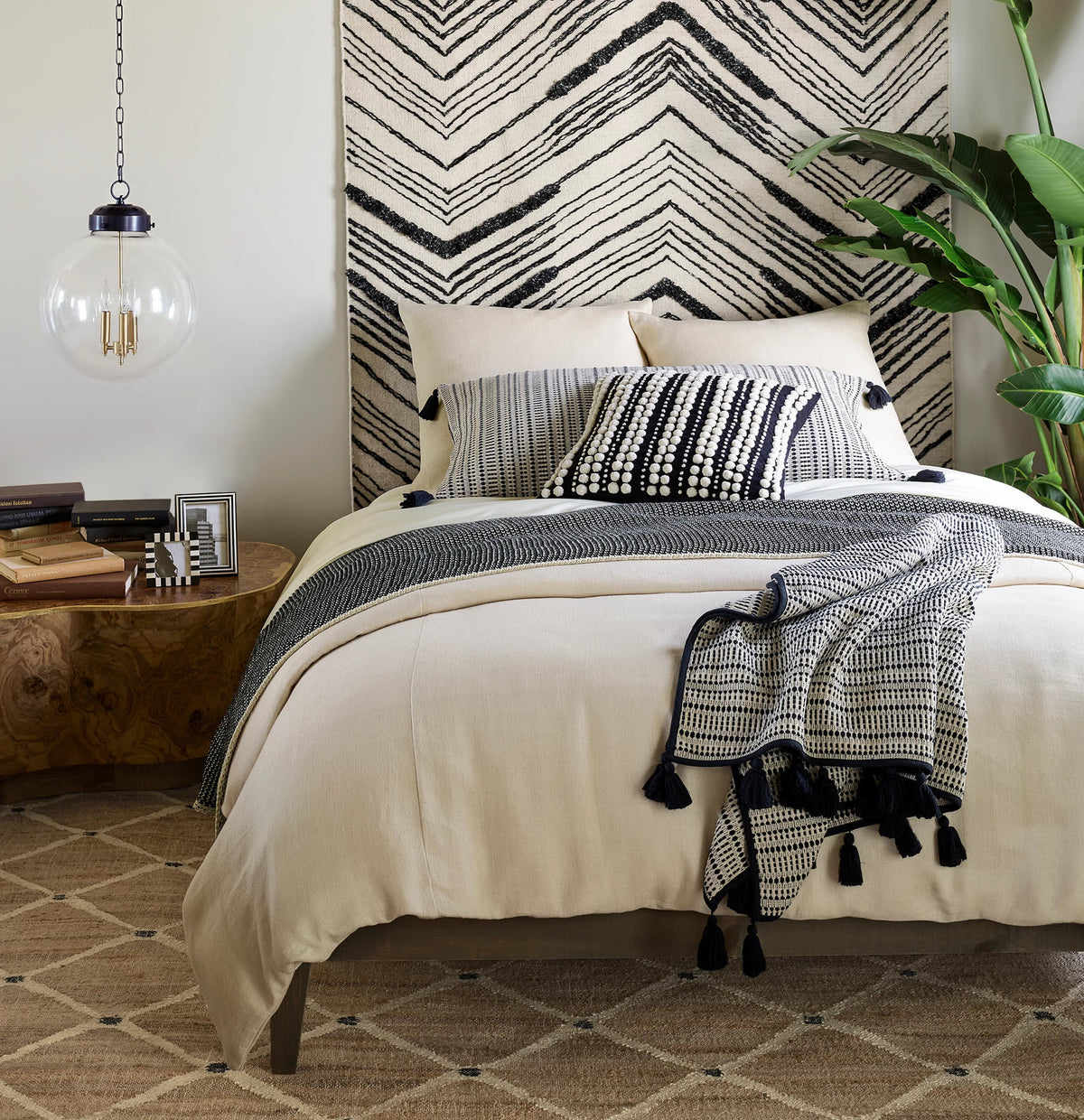 Kali Handwoven Jute Rug - Natural, styled in a room - Starboard Lane