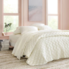 Silken Solid Sheet Set, Ivory, styled on the bed - Starboard Lane