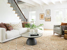 Kali Handwoven Jute Rug - Natural, styled in a room - Starboard Lane