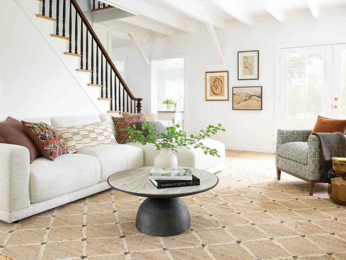 Kali Handwoven Jute Rug - Natural, styled in a room - Starboard Lane