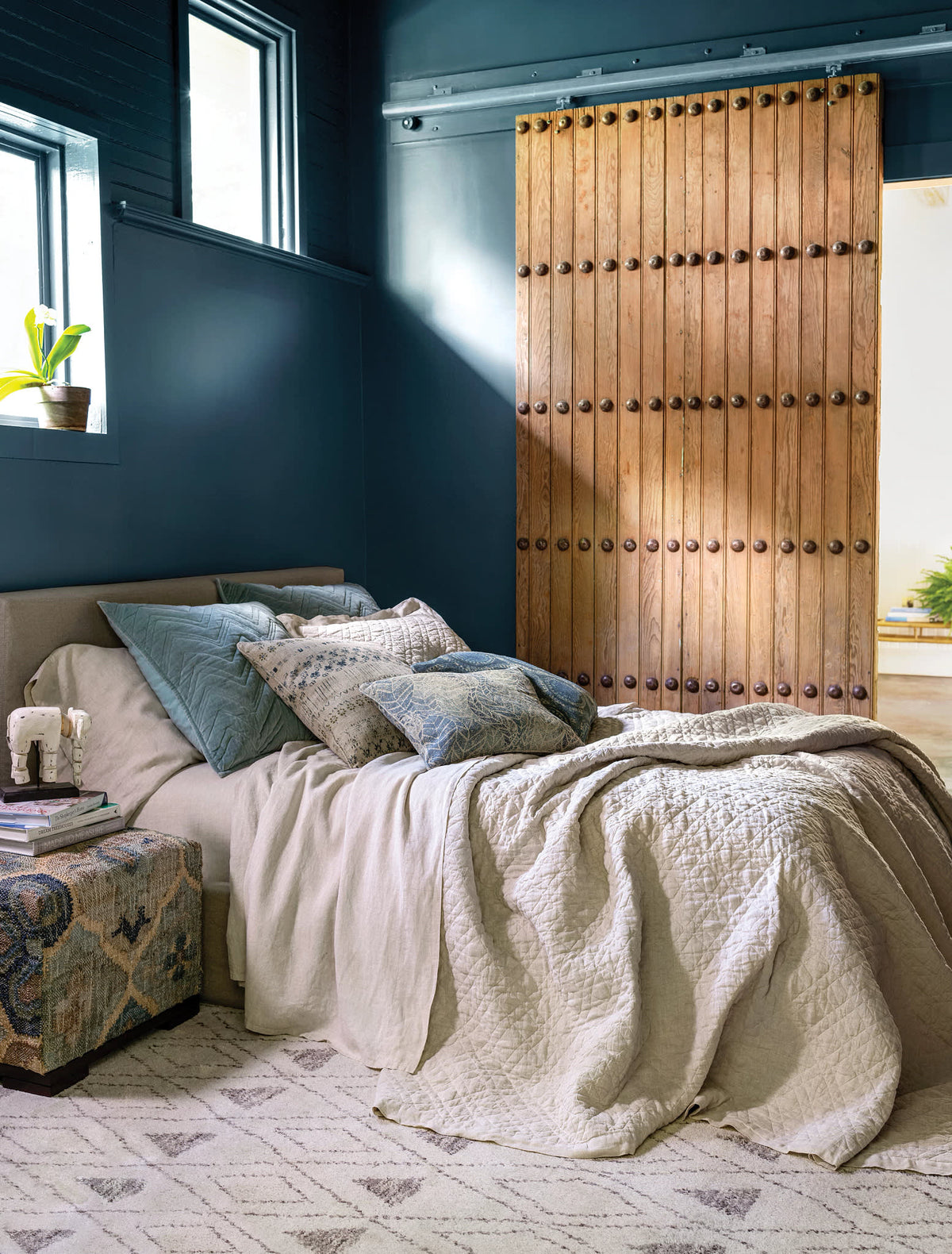 Washed Linen Quilt, Natural, styled on the bed - Starboard Lane