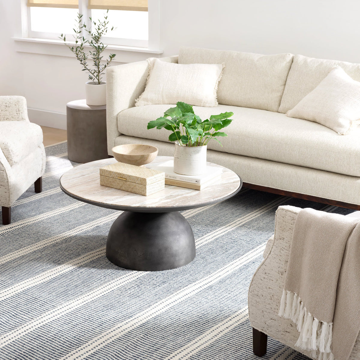 Malta Handwoven Wool Rug, Blue, styled in a room - Starboard Lane