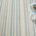 Poppy Handwoven Wool Rug, Blue, styled in a room - Starboard Lane