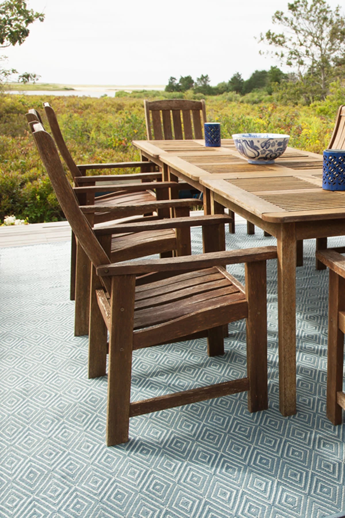 Diamond Indoor/Outdoor Rug, Slate/Light Blue, styled in a room - Starboard Lane