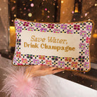 Drink Champagne Needlepoint Pillow, styled - Starboard Lane