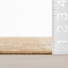Odette Jute Rug - Natural, styled in a room - Starboard Lane