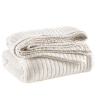 Boyfriend Matelasse Coverlet, Ivory, styled on the bed - Starboard Lane