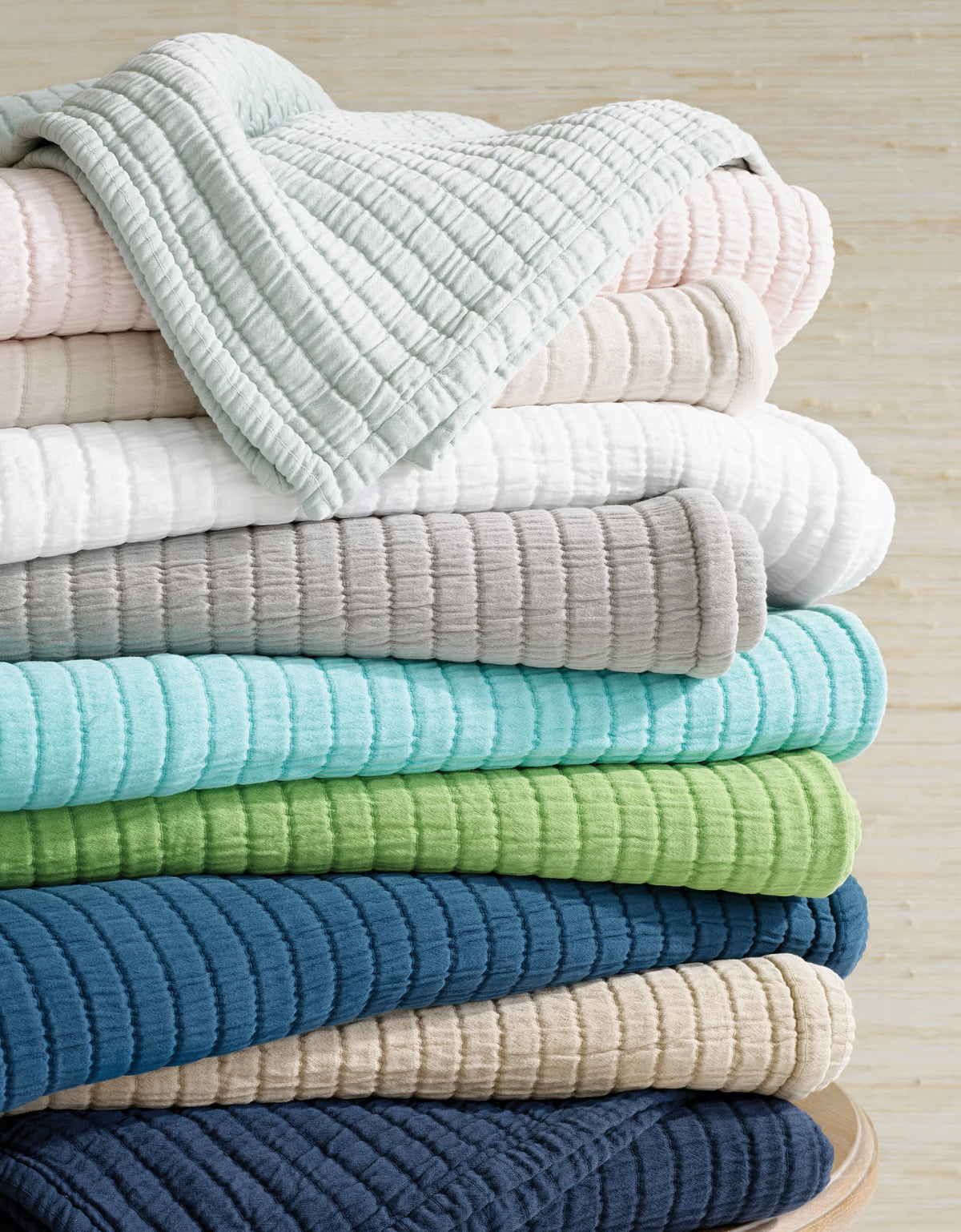 Boyfriend Matelasse Coverlet, Aegean, styled on the bed - Starboard Lane