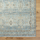 Khorasan Hand-Knotted Wool Rug - Sky Blue, styled in a room - Starboard Lane