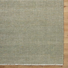 Saga Handwoven Wool Rug, styled in a room - Starboard Lane
