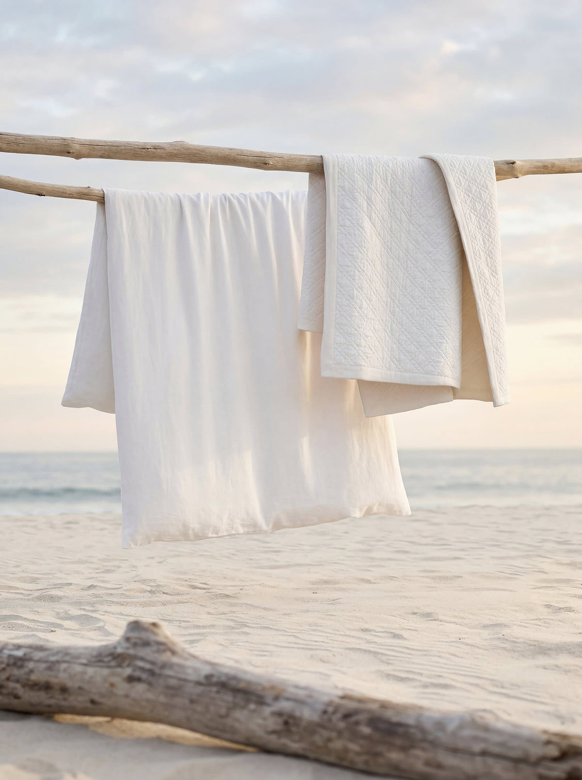 Washed Linen Quilt, White, styled on the bed - Starboard Lane